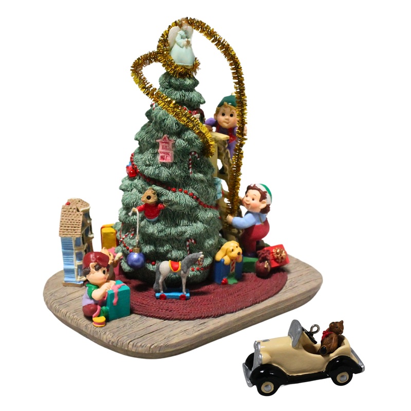 Hallmark Ornament: 1997 Trimming Santa's Tree  | QXC5175
